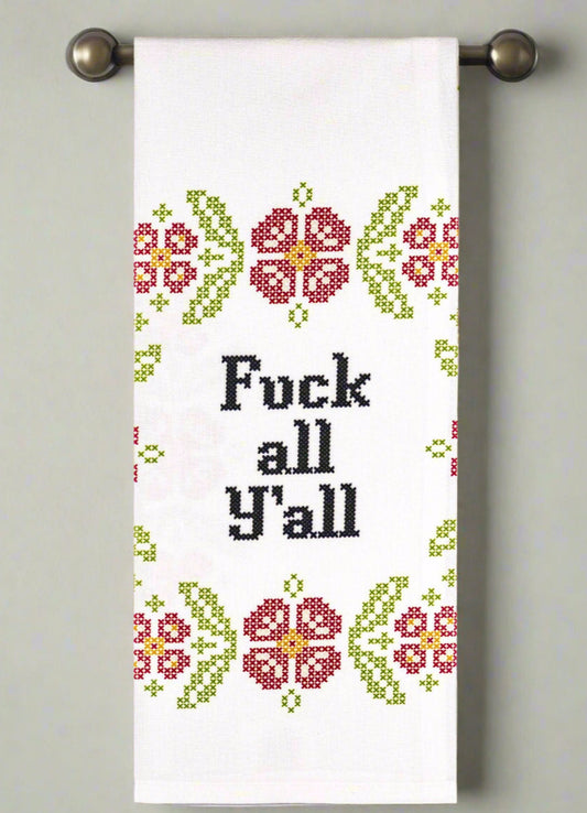 Towel with floral pattern and text on a gray background